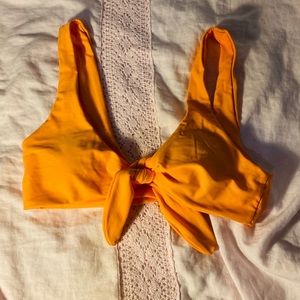 orange creamsicle colored bikini top